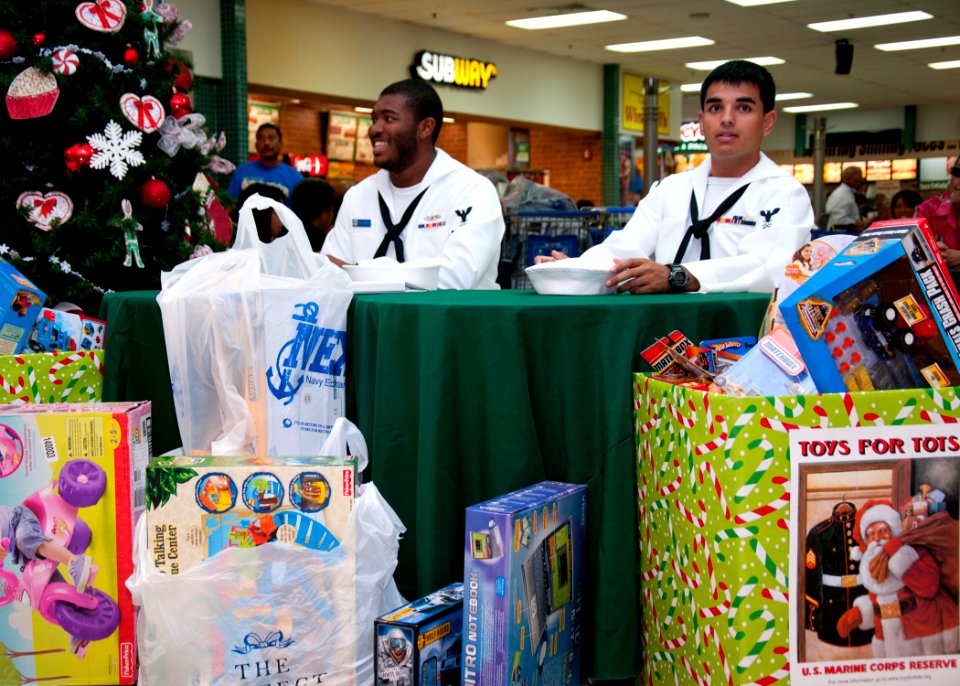 US Navy 111120-N-CB621-084 Logistics Specialists 3rd Class Eric Valadez and Brandon Herring, both assigned to the submarine tender USS Frank Cable'