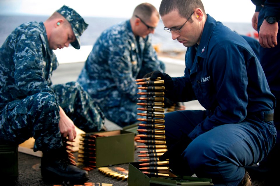 US Navy 111117-N-PB383-025 Sailors aboard the amphibious transport dock ship USS New Orleans (LPD 18) organize ammunition during a .50-caliber live