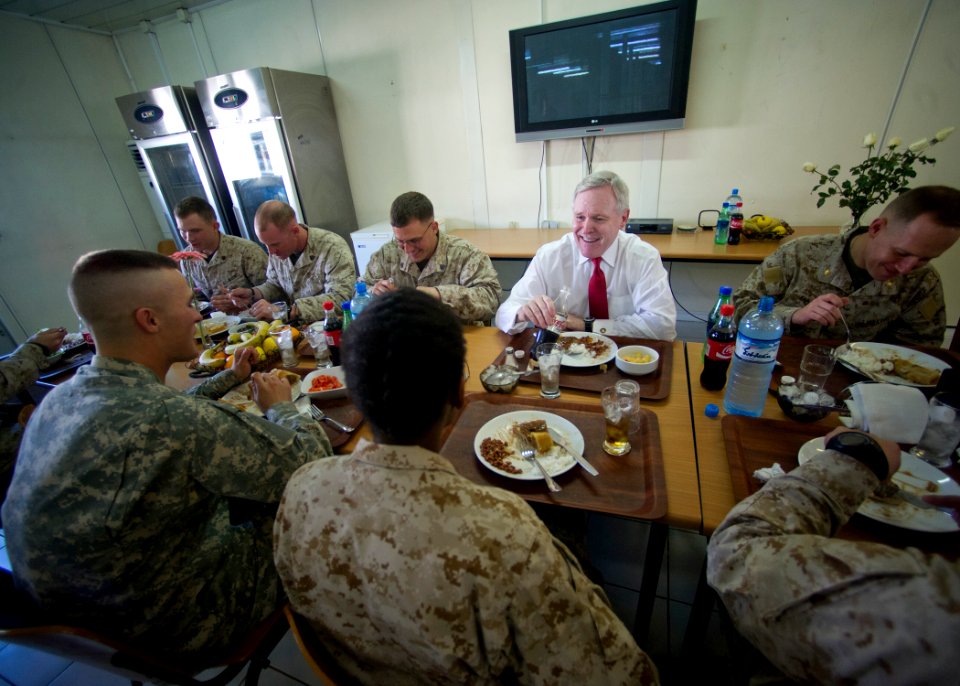 US Navy 111119-N-AC887-004 Secretary of the Navy (SECNAV) the Honorable Ray Mabus eats lunch with Sailors and Marines at the Krtsanisi Training Are
