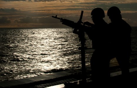 US Navy 111117-N-PB383-113 Sailors aboard the amphibious transport dock ship USS New Orleans (LPD 18) participate in a .50-caliber live-fire exerci