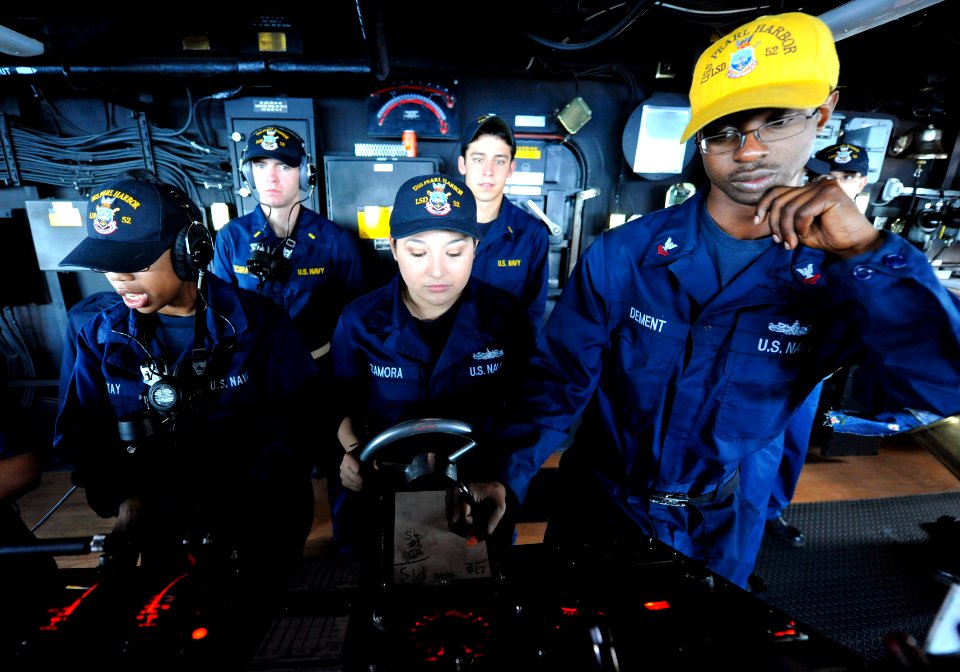 US Navy 111120-N-KS651-103 Members of the special sea and anchor detail stand watch aboard dock landing ship USS Pearl Harbor (LSD 52) during a rep
