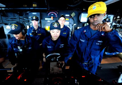 US Navy 111120-N-KS651-103 Members of the special sea and anchor detail stand watch aboard dock landing ship USS Pearl Harbor (LSD 52) during a rep