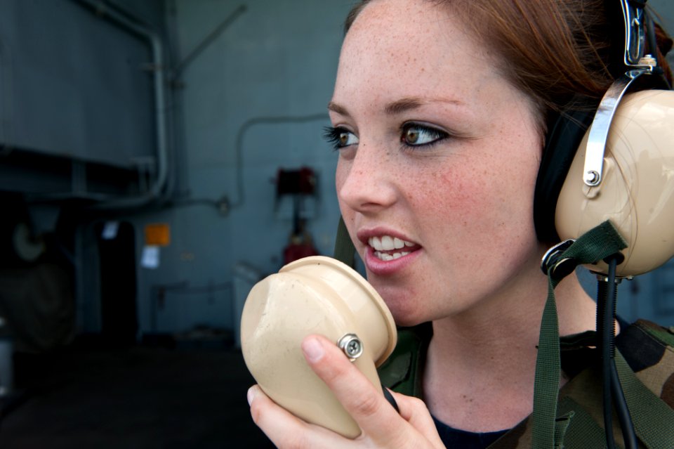 US Navy 111123-N-OY799-020 Aviation Ordnanceman Airman Ashley Barnes, from Lewisville, Texas, reports surface contacts while on a .50-caliber machi