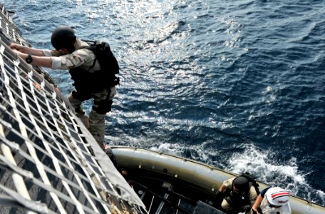 US Navy 111121-N-IR479-028 Sailors conduct visit, board, search and seizure training photo