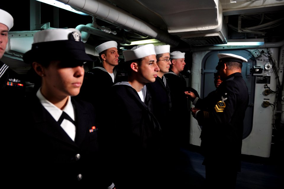 US Navy 111117-N-YZ751-013 Senior Chief Sonar Technician (Surface) Andre A. Delarosa, right, and Command Master Chief Paulette Brock conduct a dres