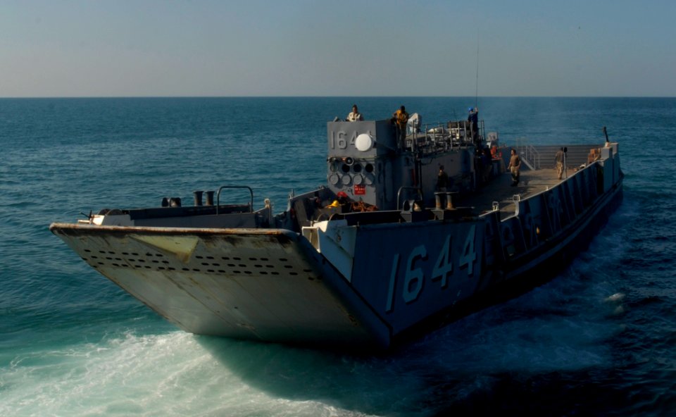 US Navy 111121-N-KA046-154 Assault Craft Unit launches from the well deck of the amphibious dock landing ship