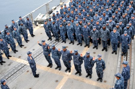US Navy 111125-N-MO201-037 Vice Chief of Naval Operations (VCNO) Adm. Mark Ferguson reenlists six sailors aboard the guided-missile frigate USS Sam