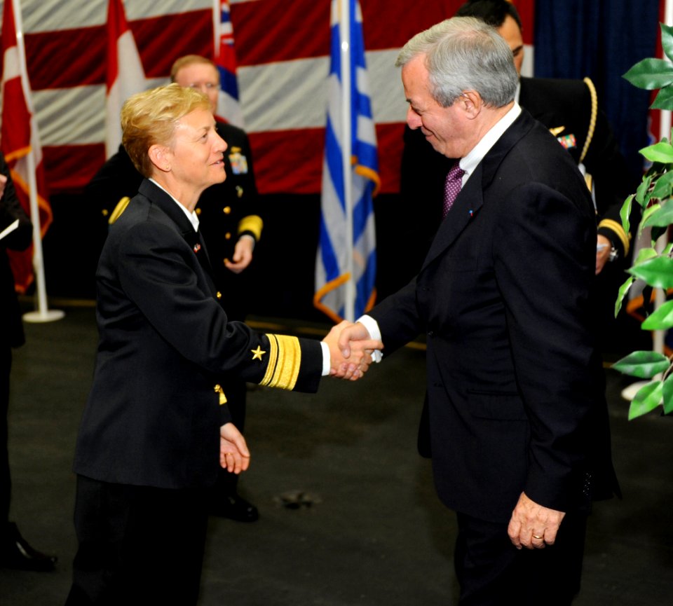 US Navy 111125-N-TB177-144 Rear Adm. Nora Tyson, Commander, Carrier Strike Group 2, shakes hands with Jose Allegrini, the Deputy Mayor of Marseille