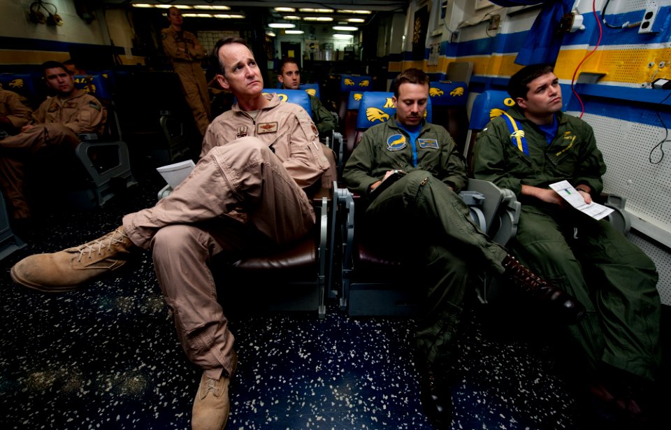 US Navy 111126-N-OY799-004 Maj. Gen. Jim Jones, left, deputy commander of U.S. Air Force Central Command, attends a briefing in the ready room aboa