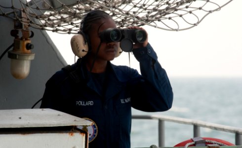 US Navy 111123-N-OY799-026 Boatswain's Mate Seaman Courtney Pollard, from Fort Worth, Texas, stands watch on the fantail aboard the Nimitz-class ai
