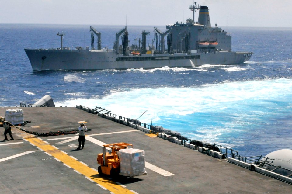 US Navy 111126-N-KM175-008 The forward-deployed amphibious assault ship USS Essex (LHD 2) breaks away from the Military Sealift Command fleet reple