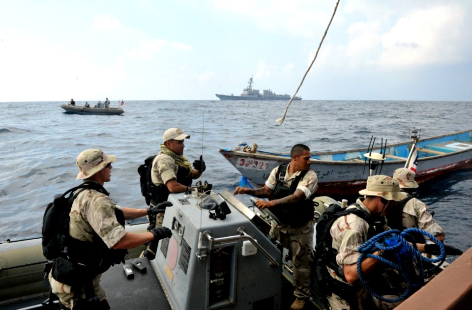 US Navy 111122-N-IR479-408 Sailors assigned to the visit, board, search and seizure team from the guided-missile destroyer USS Kidd (DDG 100) board