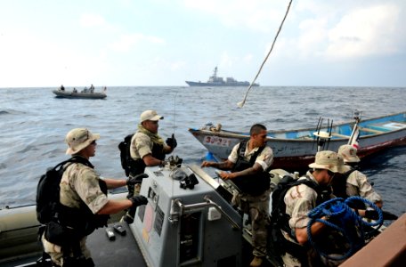 US Navy 111122-N-IR479-408 Sailors assigned to the visit, board, search and seizure team from the guided-missile destroyer USS Kidd (DDG 100) board