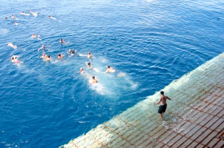 US Navy 111125-N-BJ752-106 Sailors and Marines aboard the multi-purpose amphibious assault ship USS Essex (LHD 2) participate in a swim call