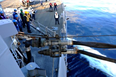 US Navy 111129-N-YZ751-035 Sailors and Military Sealift Command personel conduct a replenishment at sea