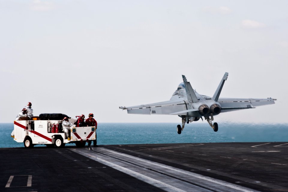 US Navy 111123-N-BT887-156 An F-A-18F Super Hornet from the Black Aces of Strike Fighter Squadron (VFA) 41 launches off the Nimitz-class aircraft c