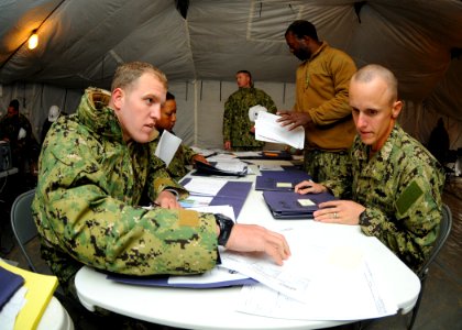 US Navy 111207-N-SN160-022 Seabees chalk packages for an embarkation training exercise