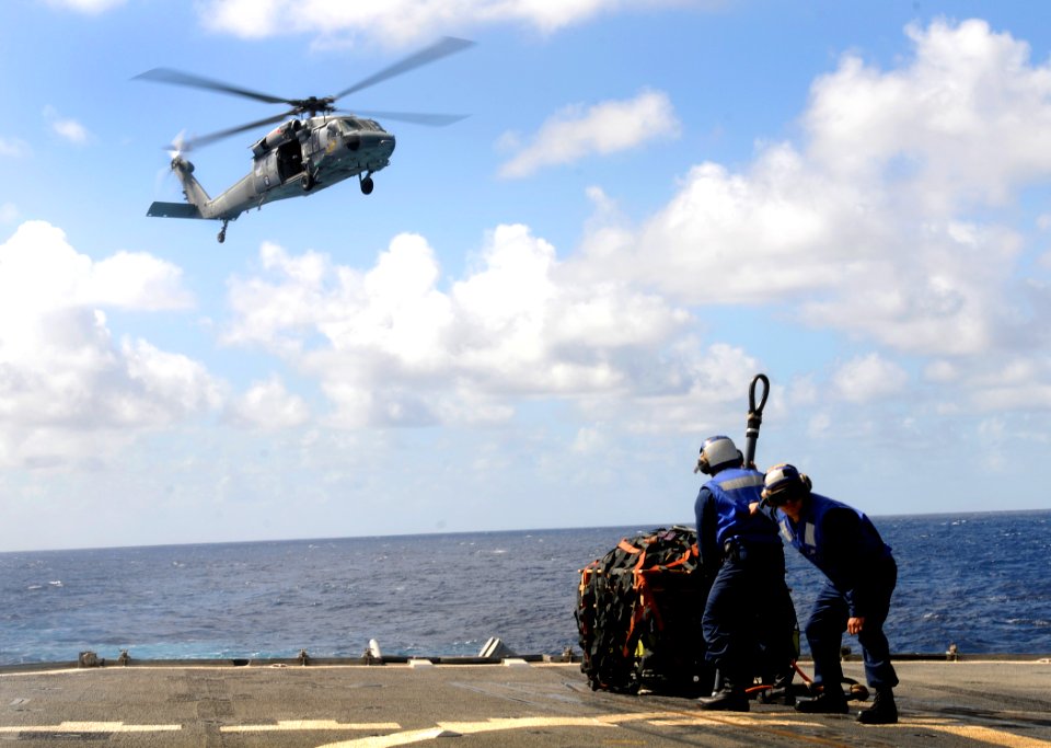 US Navy 111208-N-BC134-124 Sailors aboard the guided-missile cruiser USS Bunker Hill (CG 52) prepare a cargo pendant during a vertical replenishmen