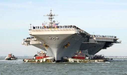US Navy 111210-N-QY430-003 The aircraft carrier USS George H.W. Bush (CVN 77) pulls into Naval Station Norfolk following a seven-month deployment