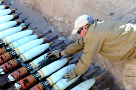 US Navy 111214-N-BA263-478 Chief Explosive Ordnance Disposal Technician Matt Clausen, assigned to Commander, Task Group (CTG) 56.1, places the fina