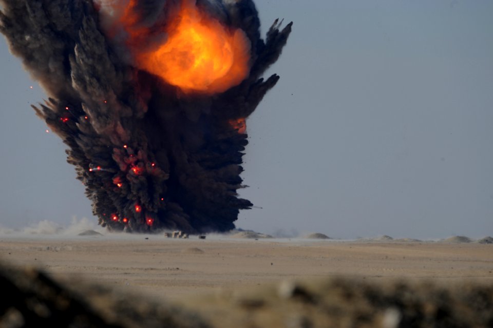 US Navy 111214-N-BA263-099 Explosive ordnance disposal (EOD) technicians assigned to Commander, Task Group (CTG) 56.1 assist the 788th Army EOD Tea