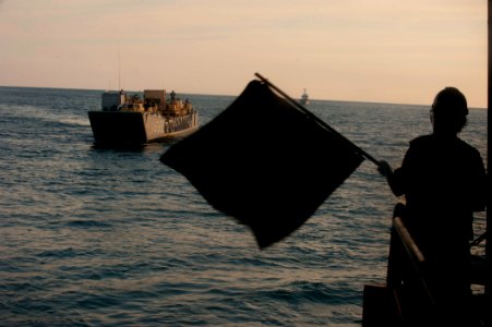 US Navy 111211-N-PB383-902 An assault craft approaches the well deck