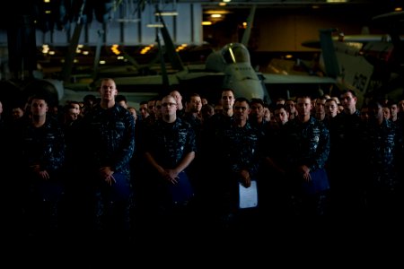 US Navy 111213-N-DR144-938 Newly promoted petty officers wait with their frocking letters