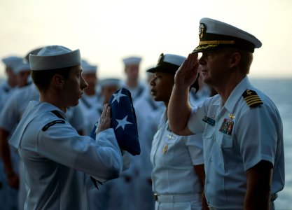 US Navy 111213-N-DR144-411 Capt. Kent D. Whalen, commanding officer of the Nimitz-class aircraft carrier USS Carl Vinson (CVN 70), renders honors a