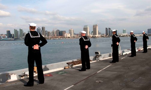 US Navy 111211-N-JN664-004 ailors assigned to the Nimitz-class aircraft carrier USS Abraham Lincoln (CVN 72) stand at parade rest while manning the photo