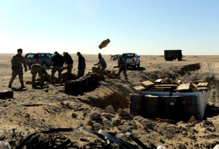US Navy 111213-N-BA263-136 Explosive ordnance disposal (EOD) technicians assigned to Commander, Task Group (CTG) 56.1, support the 788th Army EOD T