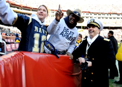 US Navy 111210-N-FC670-090 Chief of Naval Operations (CNO) Adm. Jonathan Greenert meets with fans before the 112th Army-Navy Football game at FedEx