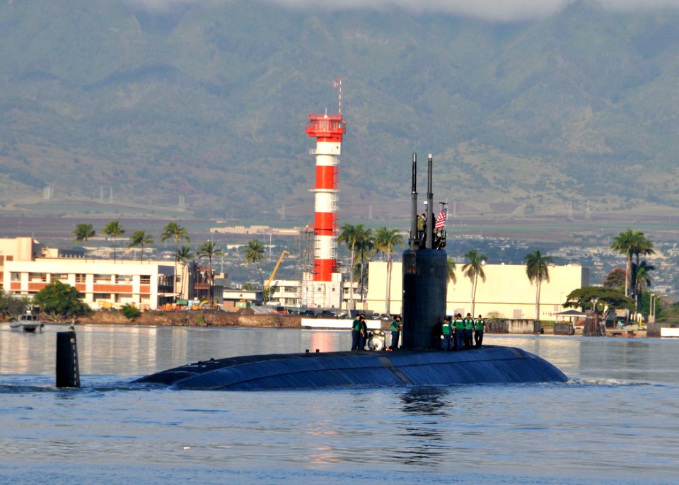 US Navy 111214-N-UK333-035 The Los Angeles-class submarine USS Tucson (SSN 770) departs Joint Base Pearl Harbor-Hickam for a scheduled six-month we