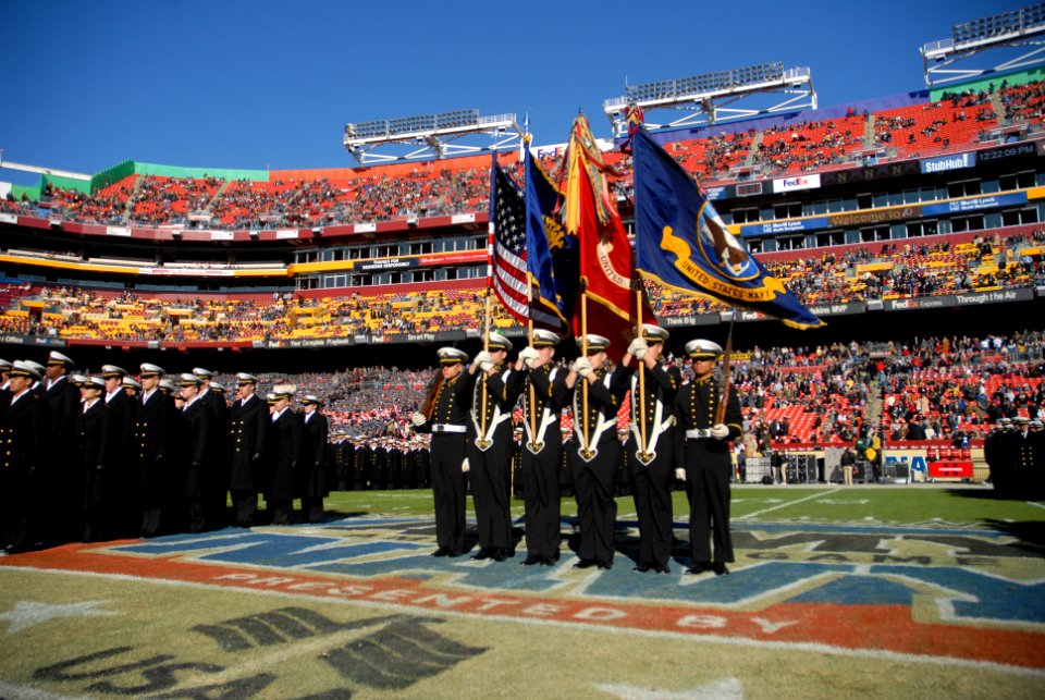 US Navy 111210-N-OA833-099 Members of the U.S. Naval Academy color guard march onto the field before the 112th Army-Navy Football game at FedEx Fie