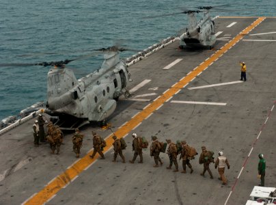 US Navy 111214-N-DX615-090 Marines embark a CH-46E Sea Stallion helicopter