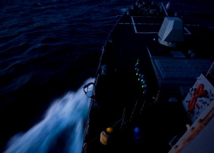 US Navy 111214-N-FI736-005 Sailors prepare for an underway replenishment aboard the Arleigh Burke-class guided-missile destroyer USS James E. Willi