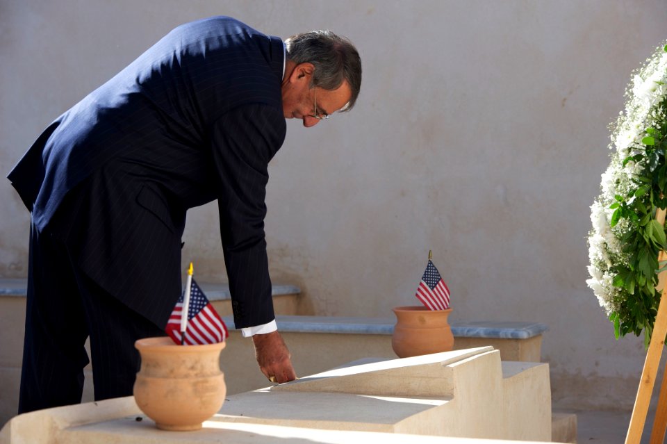 US Navy 111217-D-BW835-010 U.S. Defense Secretary Leon E. Panetta, right, tours a cemetery on the shores of Tripoli, Libya