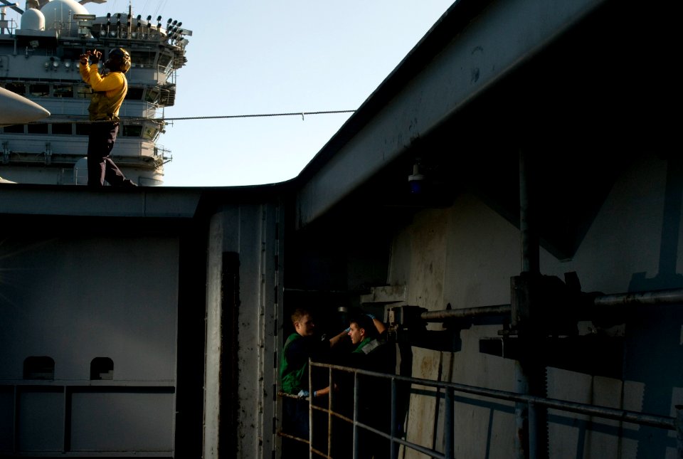 US Navy 111214-N-TZ605-103 Sailors assigned the engineering department of the Nimitz-class aircraft carrier USS Carl Vinson (CVN 70), perform maint