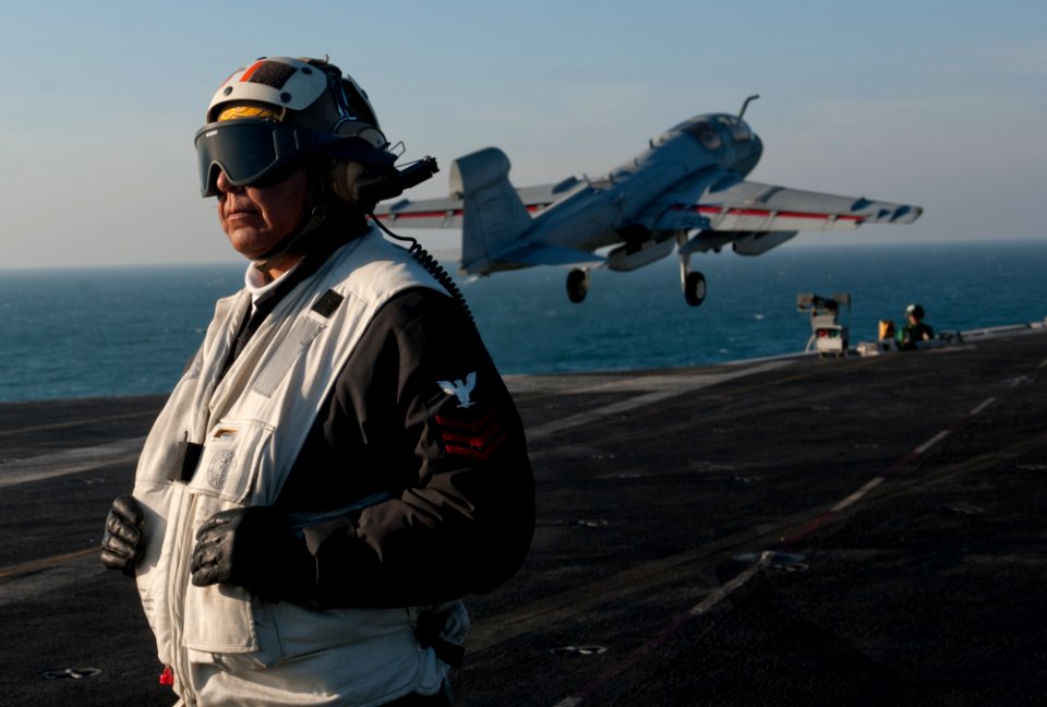 US Navy 111214-N-OY799-155 A Sailor observes flight operations