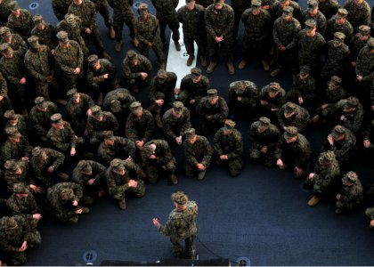 US Navy 111215-N-UM734-074 Lt. Gen. Dennis Hejlik, commanding general, U.S. Marine Corps Forces Command, speaks with junior officers on the flight