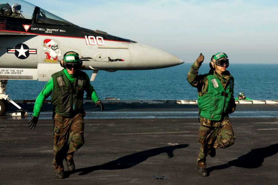 US Navy 111215-N-BT887-100 Aviation Boatswain's Mate (Equipment) 3rd Class James Trieckel and Aviation Boatswain's Mate (Equipment) Airman Anthony
