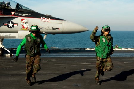 US Navy 111215-N-BT887-100 Aviation Boatswain's Mate (Equipment) 3rd Class James Trieckel and Aviation Boatswain's Mate (Equipment) Airman Anthony