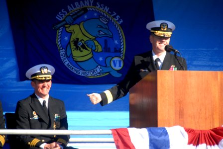 US Navy 111214-N-NK458-064 Rear Adm. Barry L. Bruner, director of Undersea Warfare, shares a laugh with Cmdr. T.R. Buchanan during a change of comm
