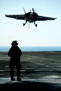 US Navy 111214-N-BT887-226 An F-A-18F Super Hornet from the Black Aces of Strike Fighter Squadron (VFA) 41 lands aboard the Nimitz-class aircraft c