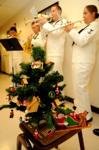 US Navy 111220-N-WP746-124 Musicians from the U.S. Pacific Fleet Band play holiday music at the office of Commander, Navy Region Hawaii