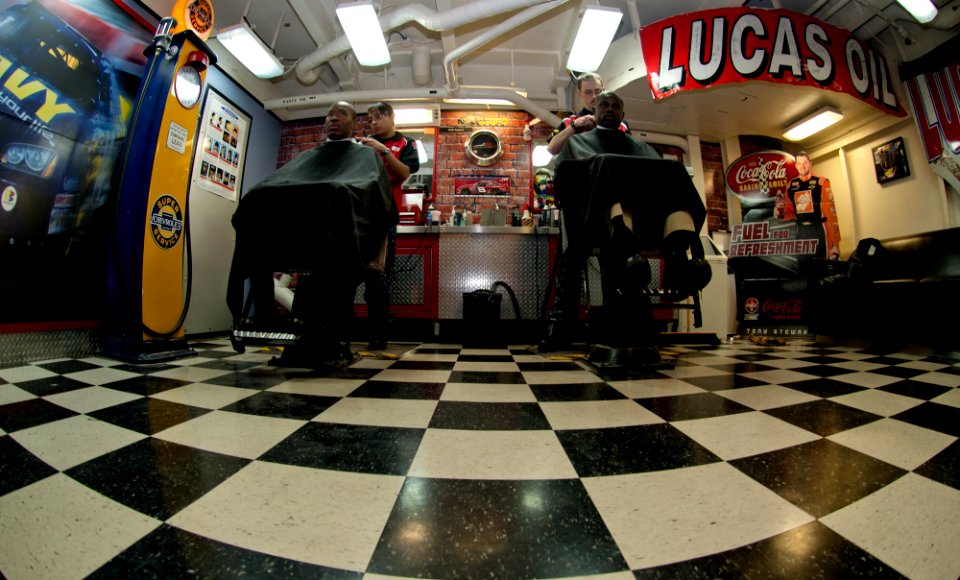 US Navy 111215-N-OY799-165 Ship's Servicemen cut hair in the barbershop aboard the Nimitz-class aircraft carrier USS John C. Stennis (CVN 74)