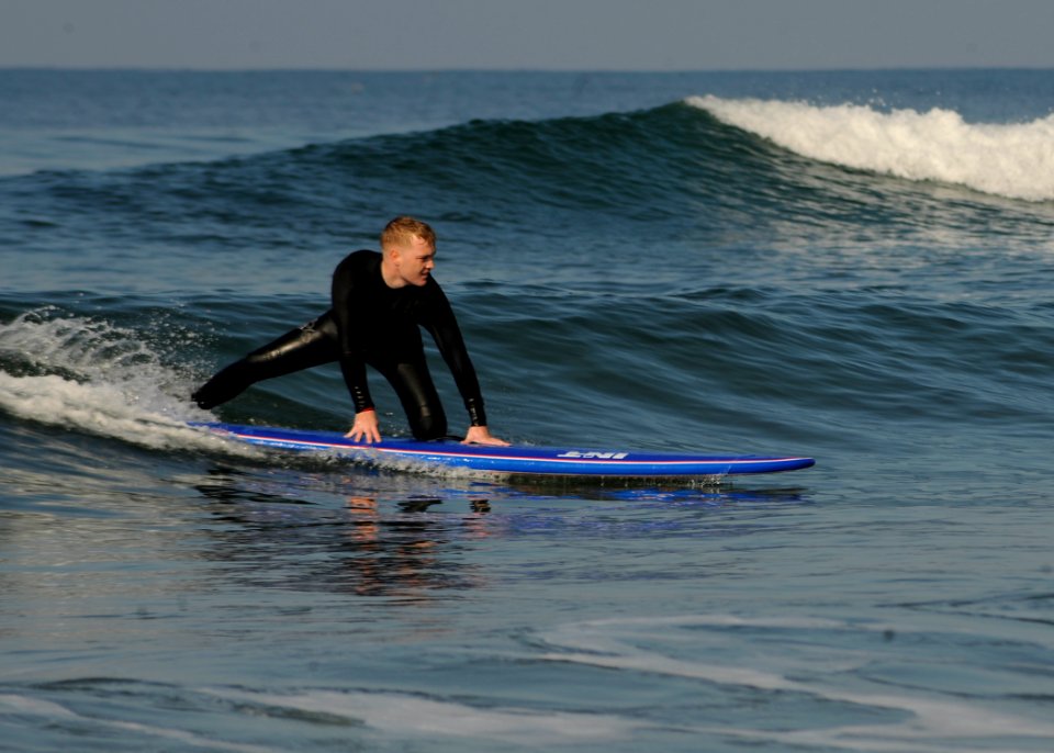 US Navy 111215-N-ZZ999-104 Cpl. Daniel J. Franke, a patient at Wounded Warrior Battalion West, Naval Medical Center San Diego, learns to surf at De