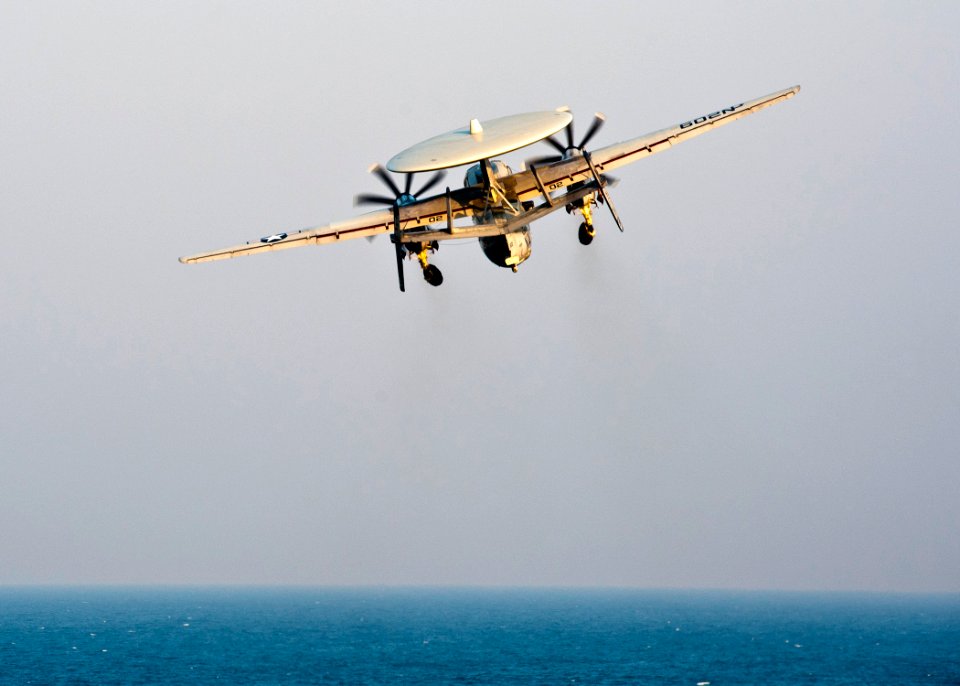 US Navy 111218-N-BT887-061 An E-2C Hawkeye from the Golden Hawks of Airborne Early Warning Squadron (VAW) 112 launches from the Nimitz-class aircra