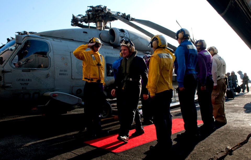 US Navy 111219-N-OY799-225 Sideboys render honors to Archbishop Timothy Broglio, archbishop for the military services, on the flight deck of the Ni