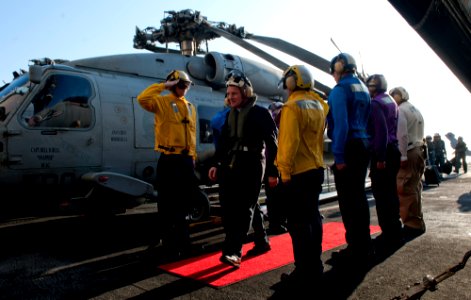 US Navy 111219-N-OY799-225 Sideboys render honors to Archbishop Timothy Broglio, archbishop for the military services, on the flight deck of the Ni