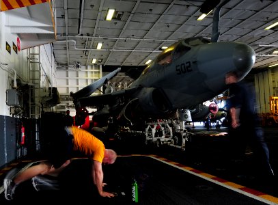US Navy 111219-N-RG587-112 Aviation Structural Mechanic (Equipment) 2nd Class James Stephens, assigned to Strike Fighter Squadron (VFA) 25, follows